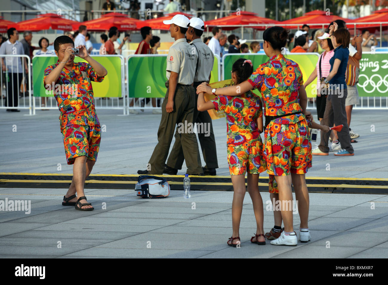 Family in identical clothing attend Olympics, Beijing, China Stock Photo