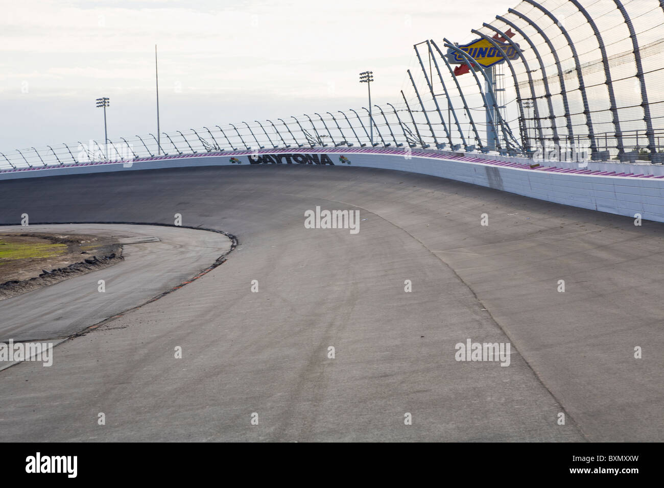 Empty banked race track at Daytona International Speedway in Daytona Beach Florida Stock Photo