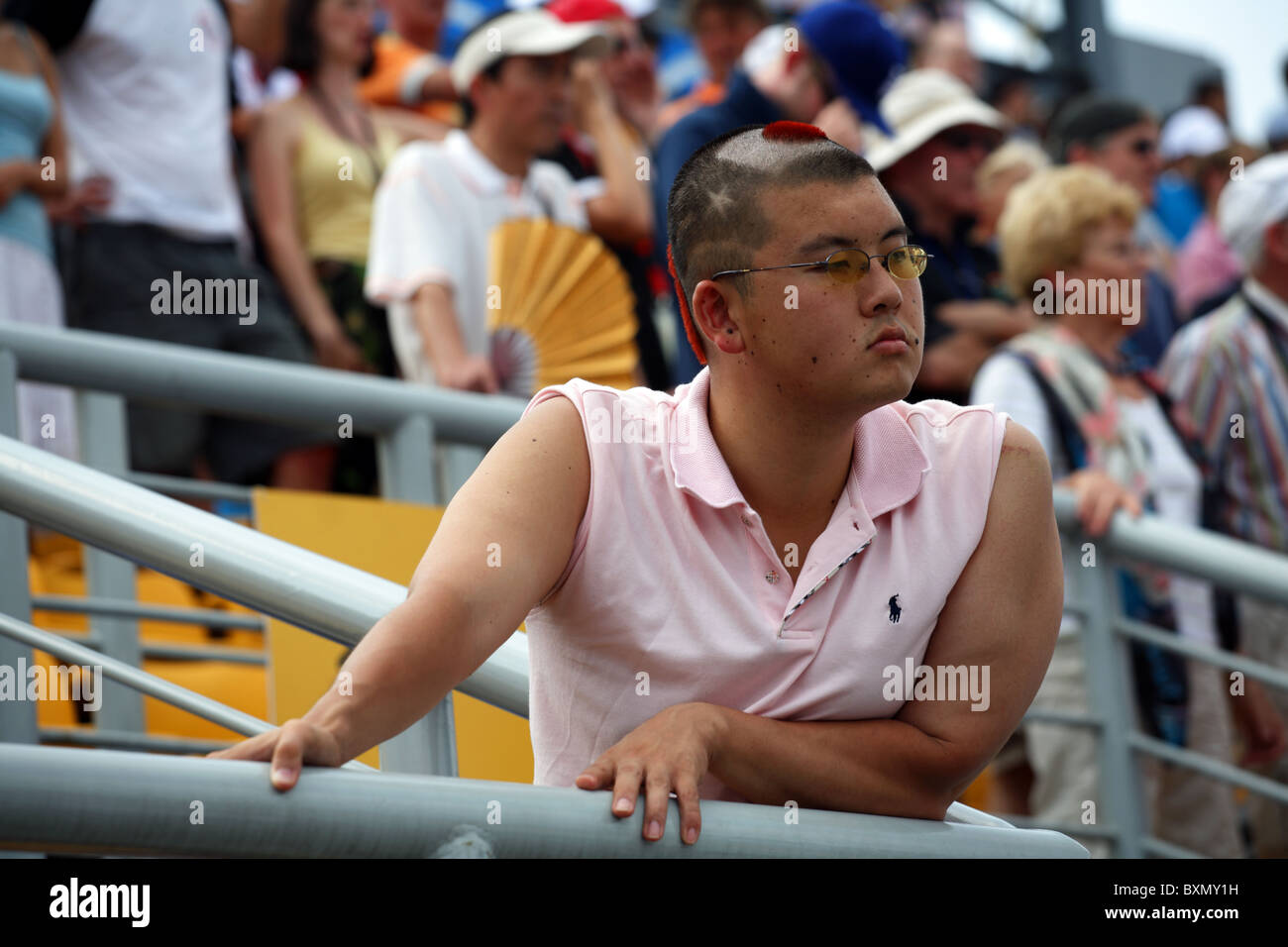Male spectator at Women's Beach Volleyball Finals, Chaoyang Park ...