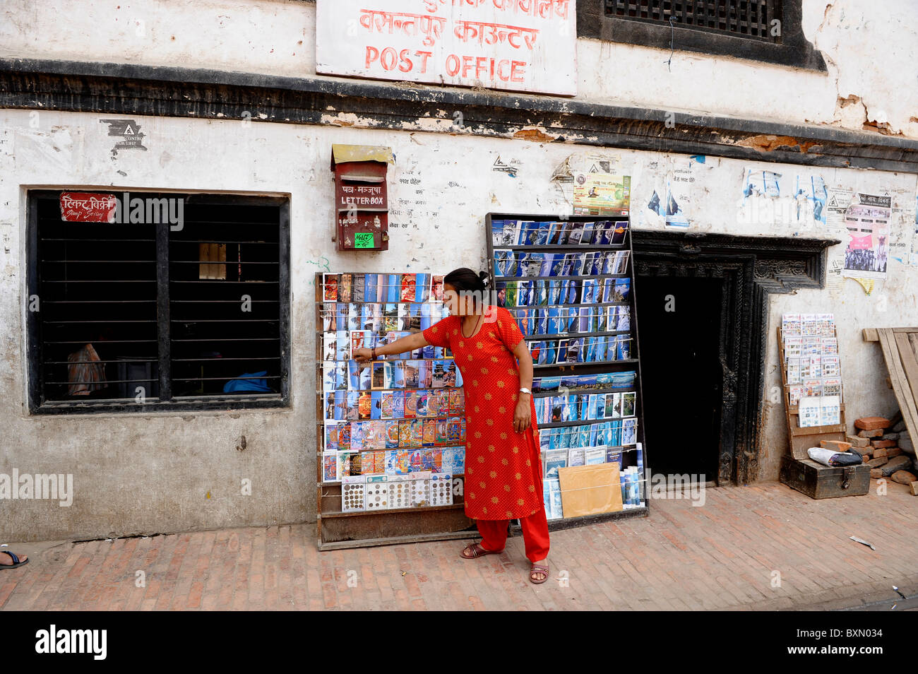 post office lady , durbar square,plaza opposite the old royal palace , nepal , kathmandu Stock