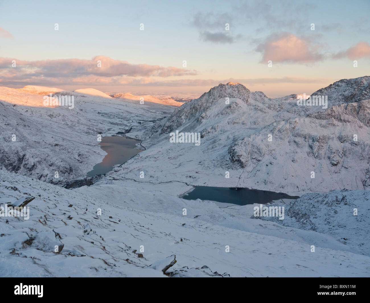 Winter sunset over a snow covered Ogwen valley, showing Tryfan and the