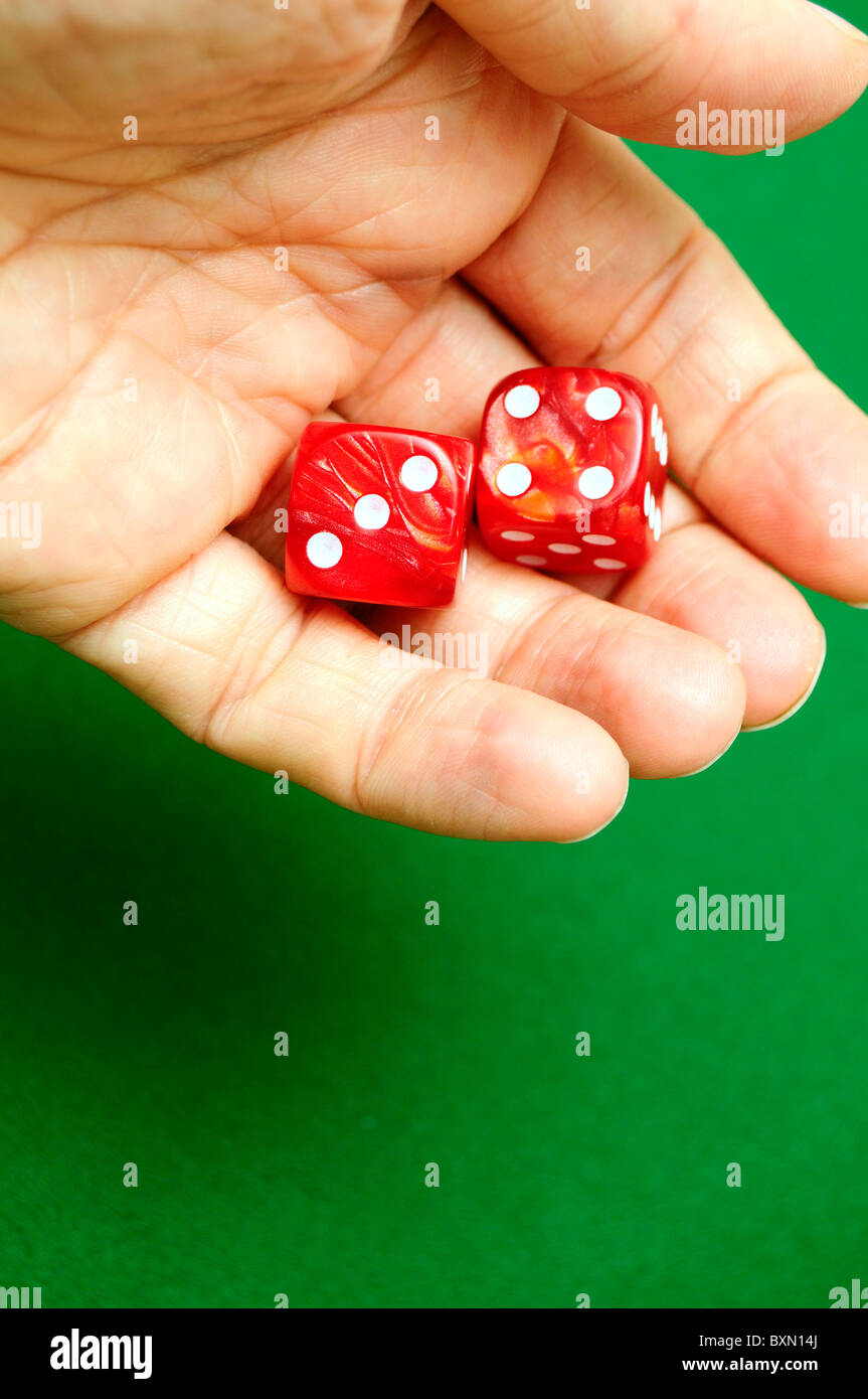 hand throwing dice Stock Photo Alamy