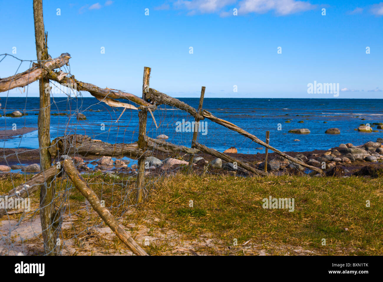 Fence by the sea on Gotland, Sweden. Stock Photo