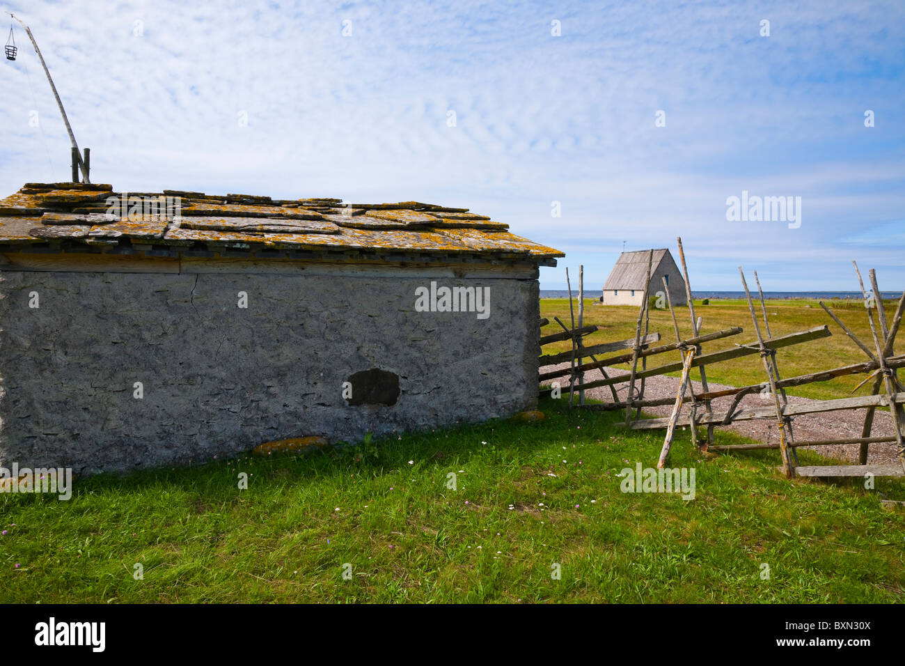 Old shed with slate slab roof, Kovik, Gotland, Sweden. Stock Photo