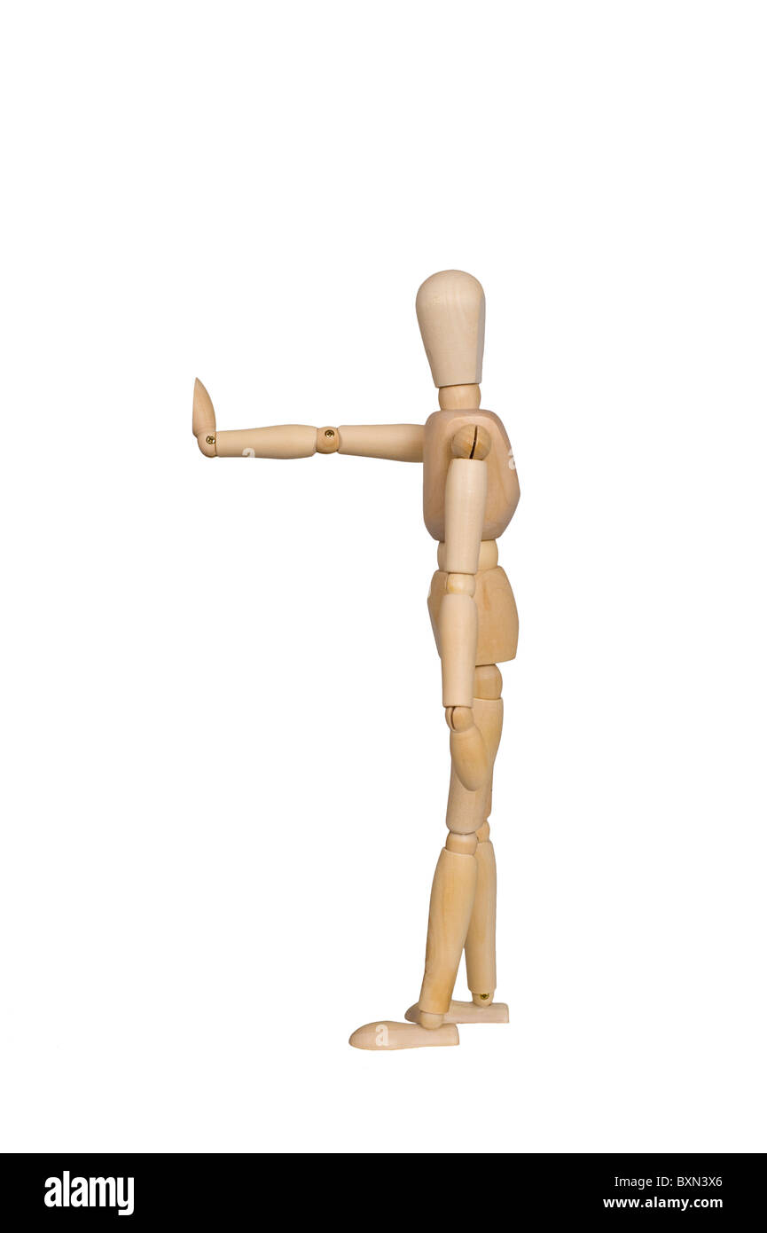 wood mannequin with hand up signaling stop Stock Photo