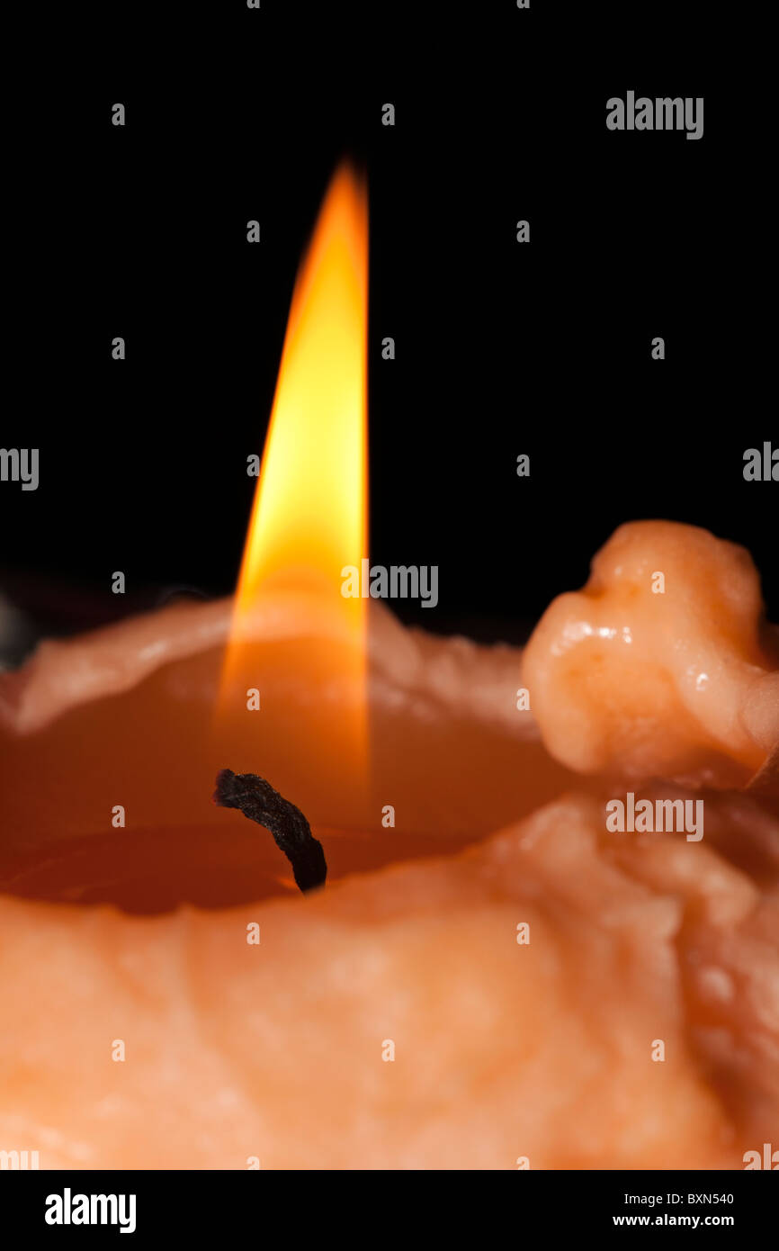 Closeup of candle wick burning with flame Stock Photo Alamy