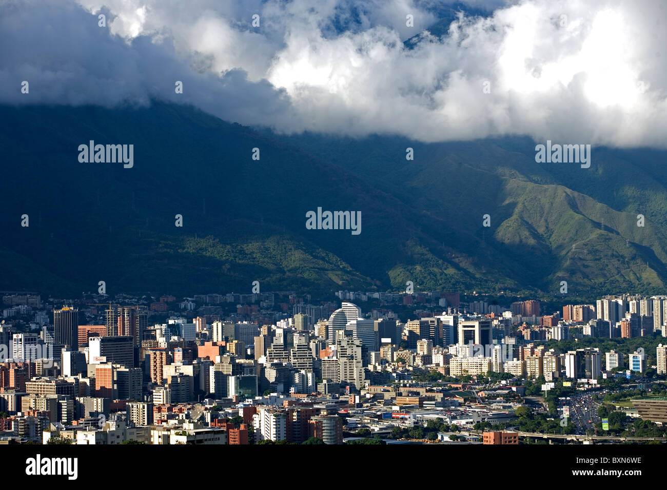 Overview of the Venezuelan capital, Caracas, at the base of Avila mountain covered by clouds, Venezuela, July 25, 2008. Stock Photo