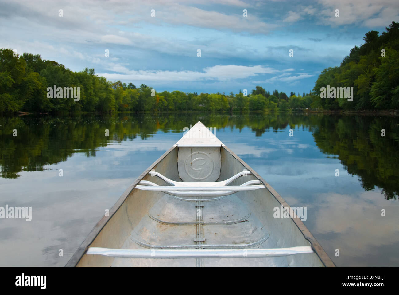 Canoe on the water of Stillwater River, Orono Stock Photo