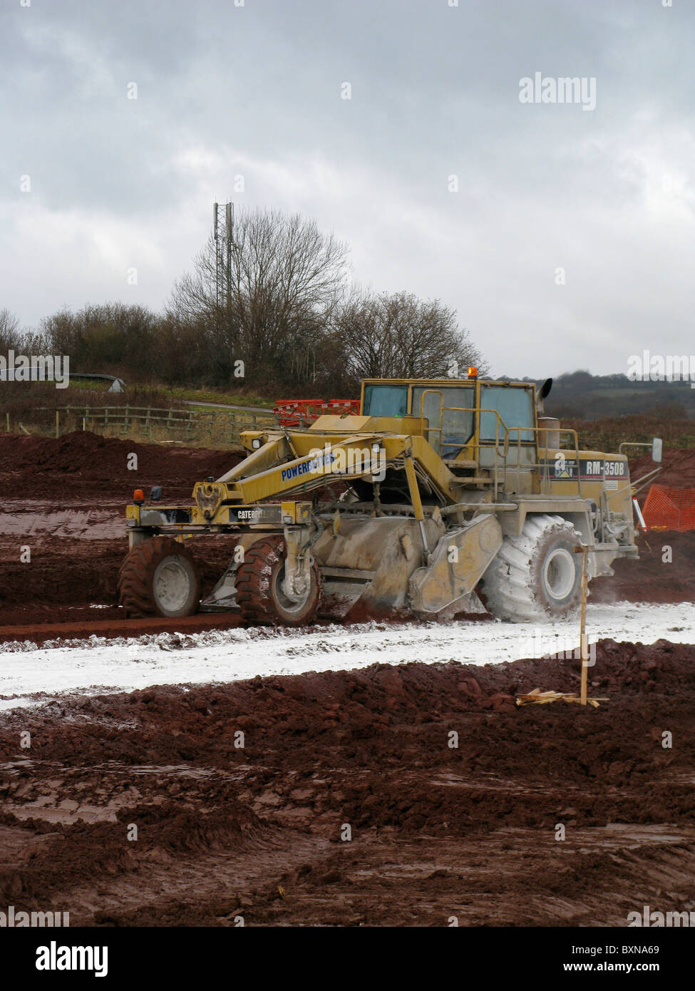 Specially adapted Caterpillar motor scraper CAT RM 350B for lime cement