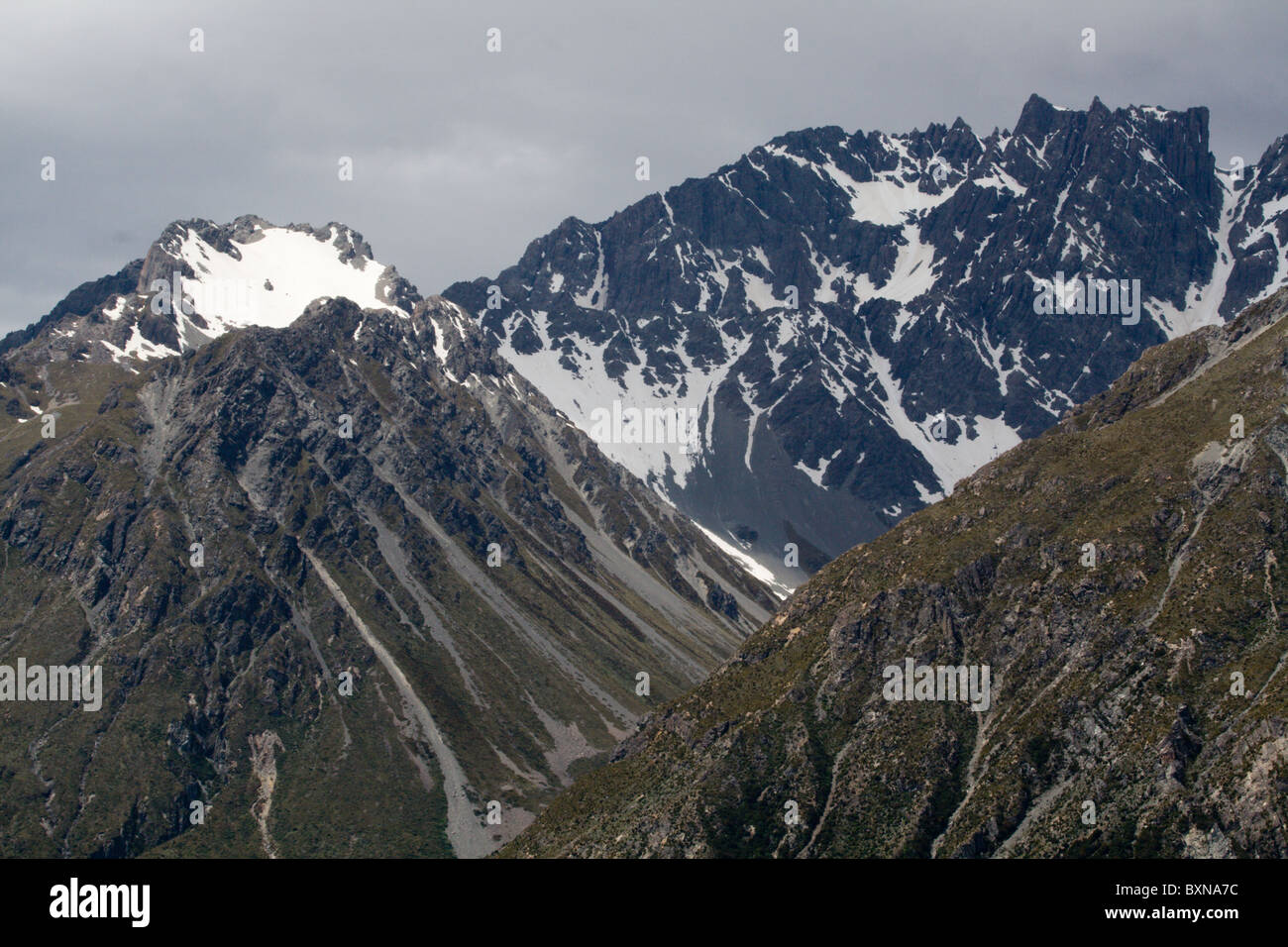 The mountains of the Southern Alps are dusted with snow, even in Summer Stock Photo