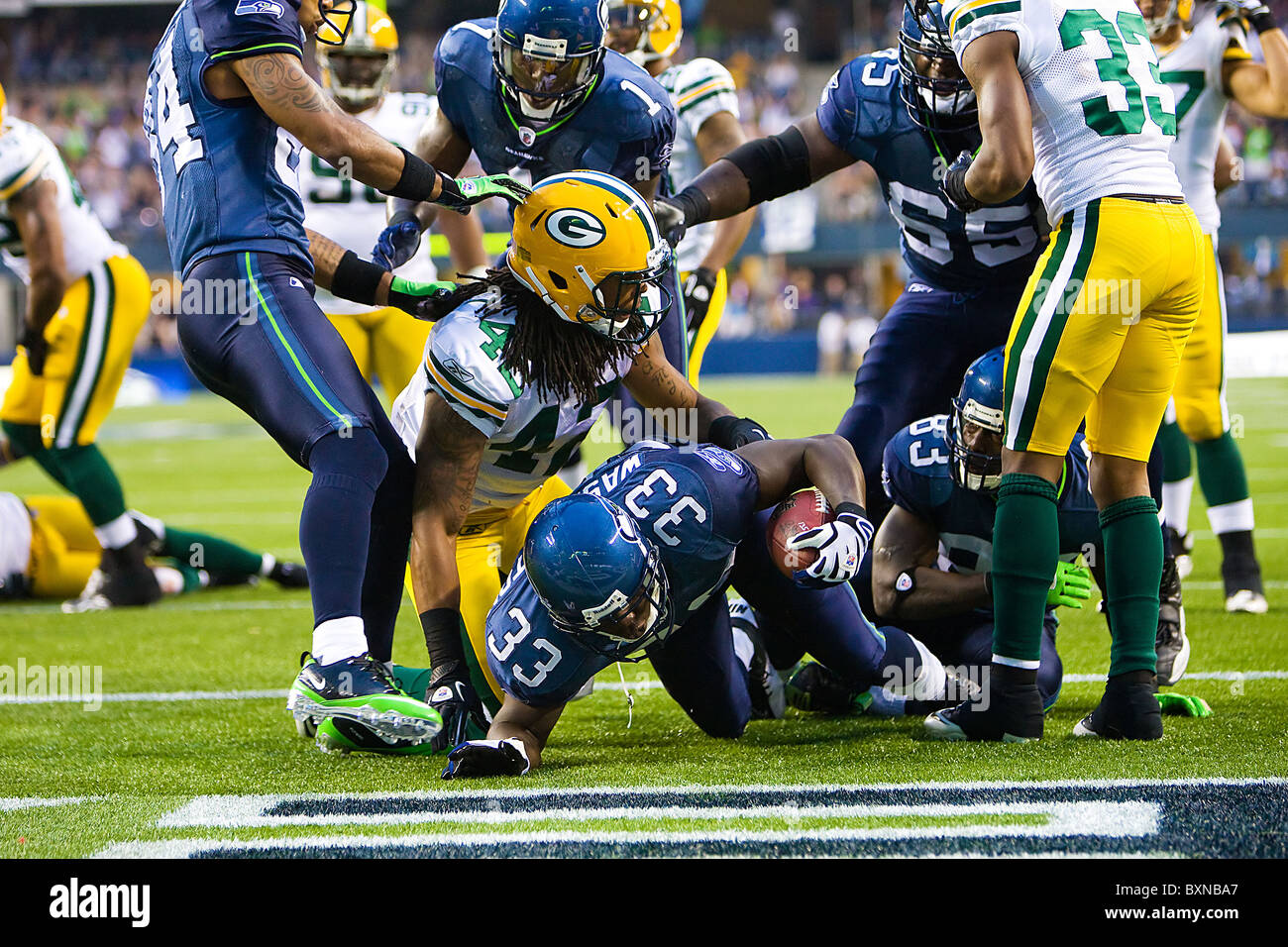 Seattle Seahawks playing the Green Bay Packers in an NFL Football game Stock Photo