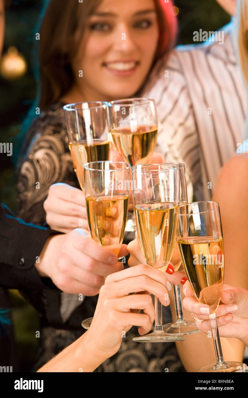 Group Of Champagne Glasses Clinking Together Stock Photo Alamy