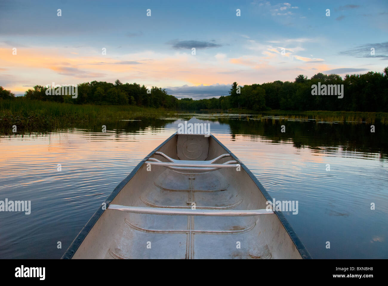 Canoe on the water of Stillwater River, Orono Stock Photo