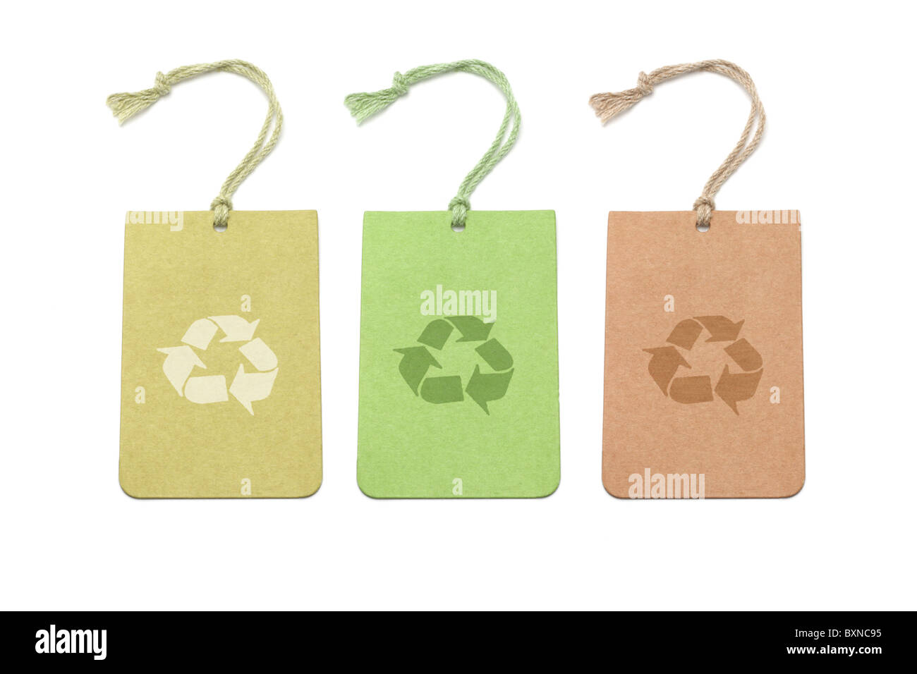 Three color tags with recycling symbols arranged on white background Stock Photo