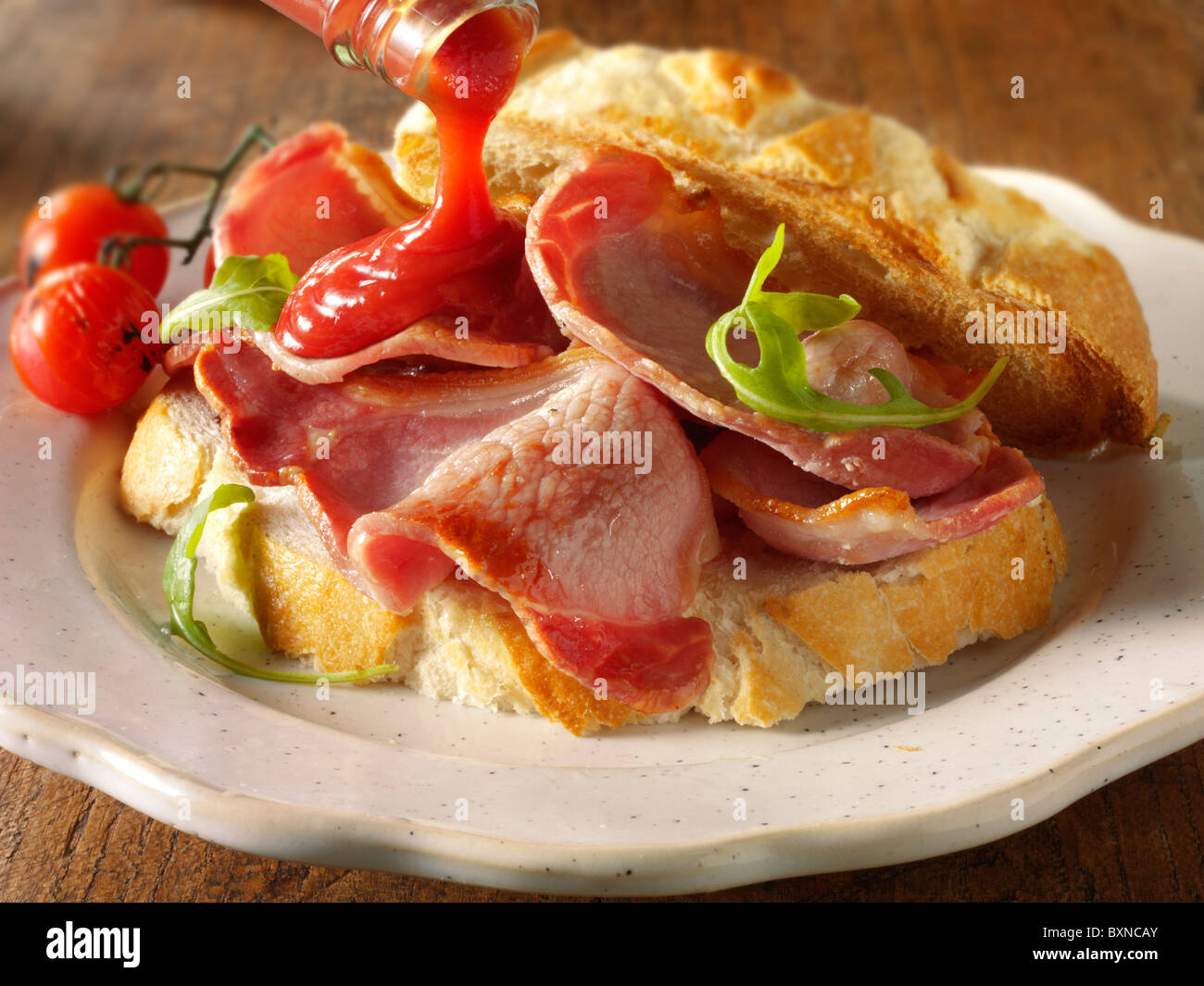 Bacon sandwich with tomato ketchup Stock Photo Alamy