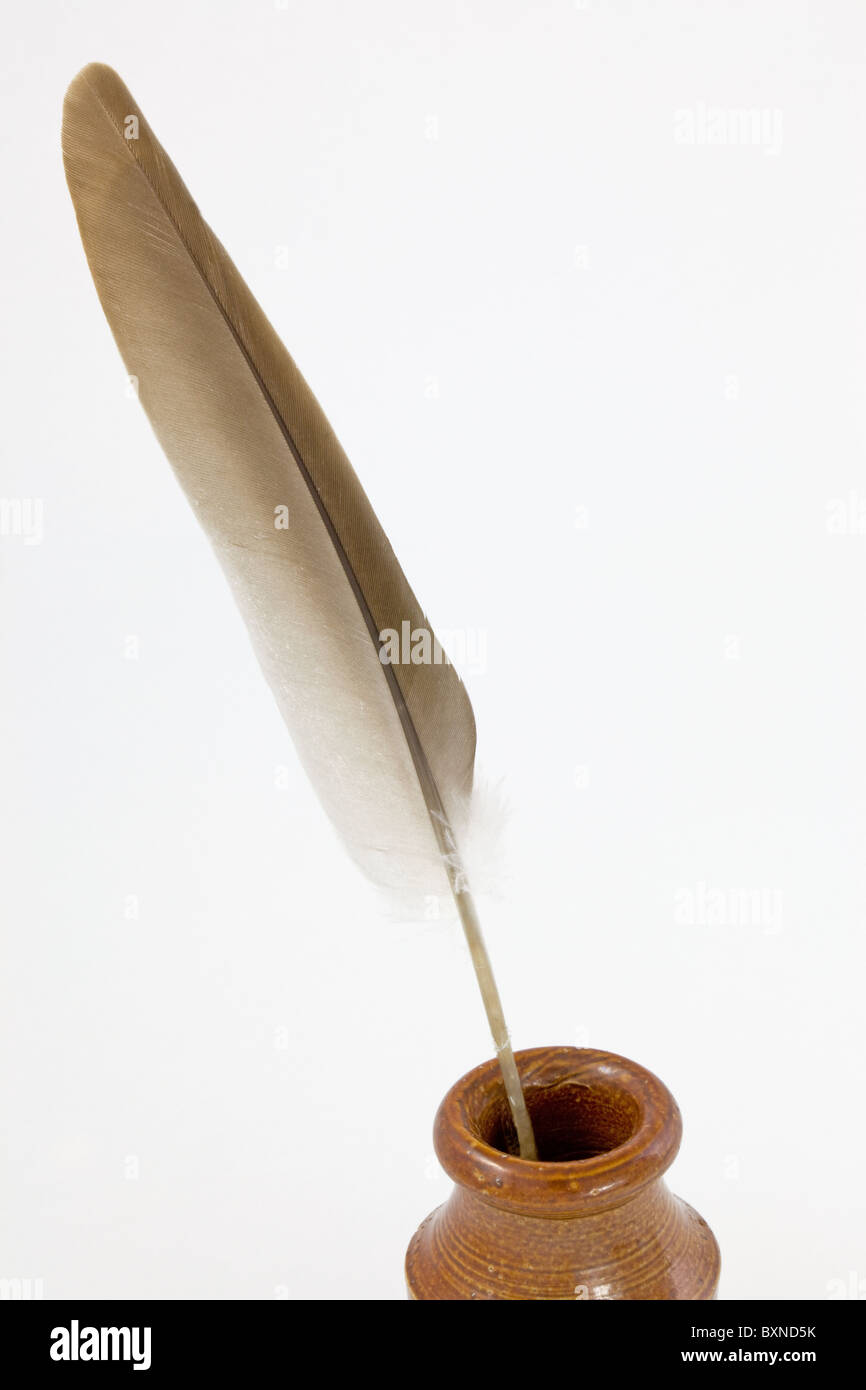 Quill pen in a Victorian inkwell Stock Photo Alamy