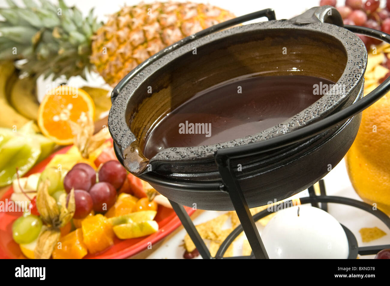 Chocolate fondue with various kind of fruit Stock Photo Alamy