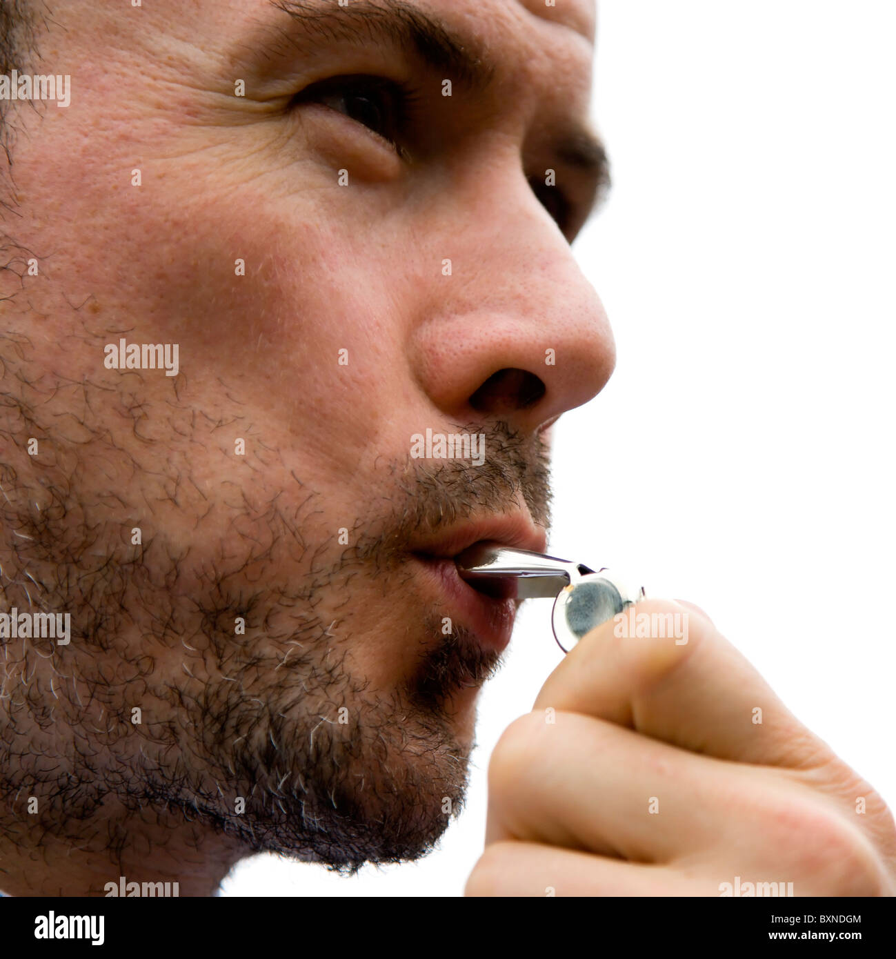 Sport, Ball Games, Referees, Male referee blowing whistle Stock Photo