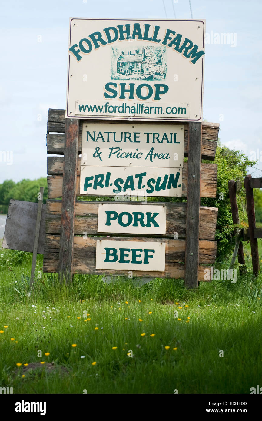 Signs at Ford Hall farm, Market Drayton, Shropshire. The farm is run, owned by 8000 people, run by Ben and Charlotte Hollins. Stock Photo