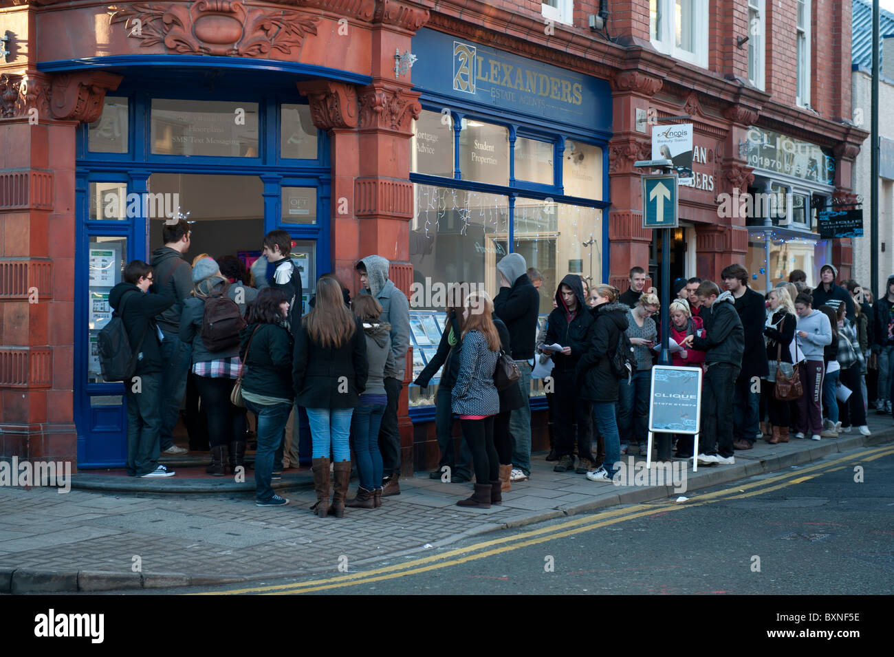 Aberystwyth University students queuing outside Alexanders estate agents to get hold of details of accommodation, Wales UK Stock Photo