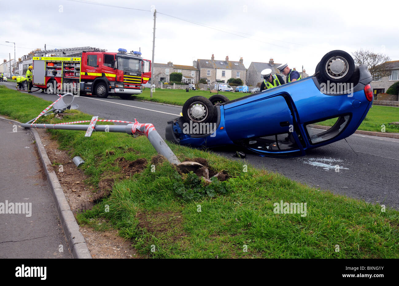 Car crash, overturned car after a traffic accident Stock Photo