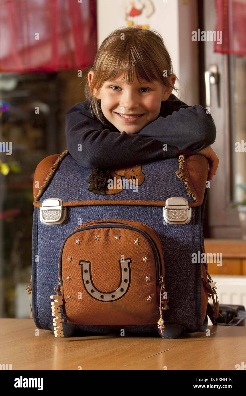 Schoolgirl with satchel Stock Photo