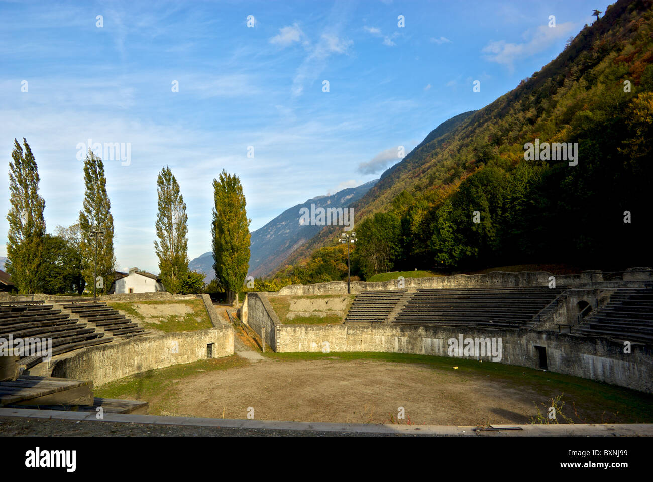 Excavated restored ancient Roman amphitheatre archaeological site Martigny Valais Switzerland Stock Photo