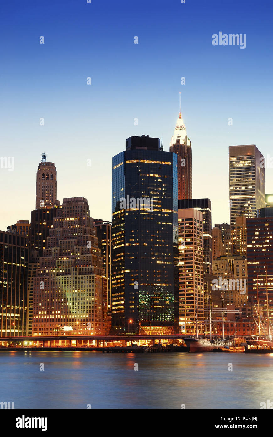 New York City Manhattan skyline at dusk over Hudson River with ...