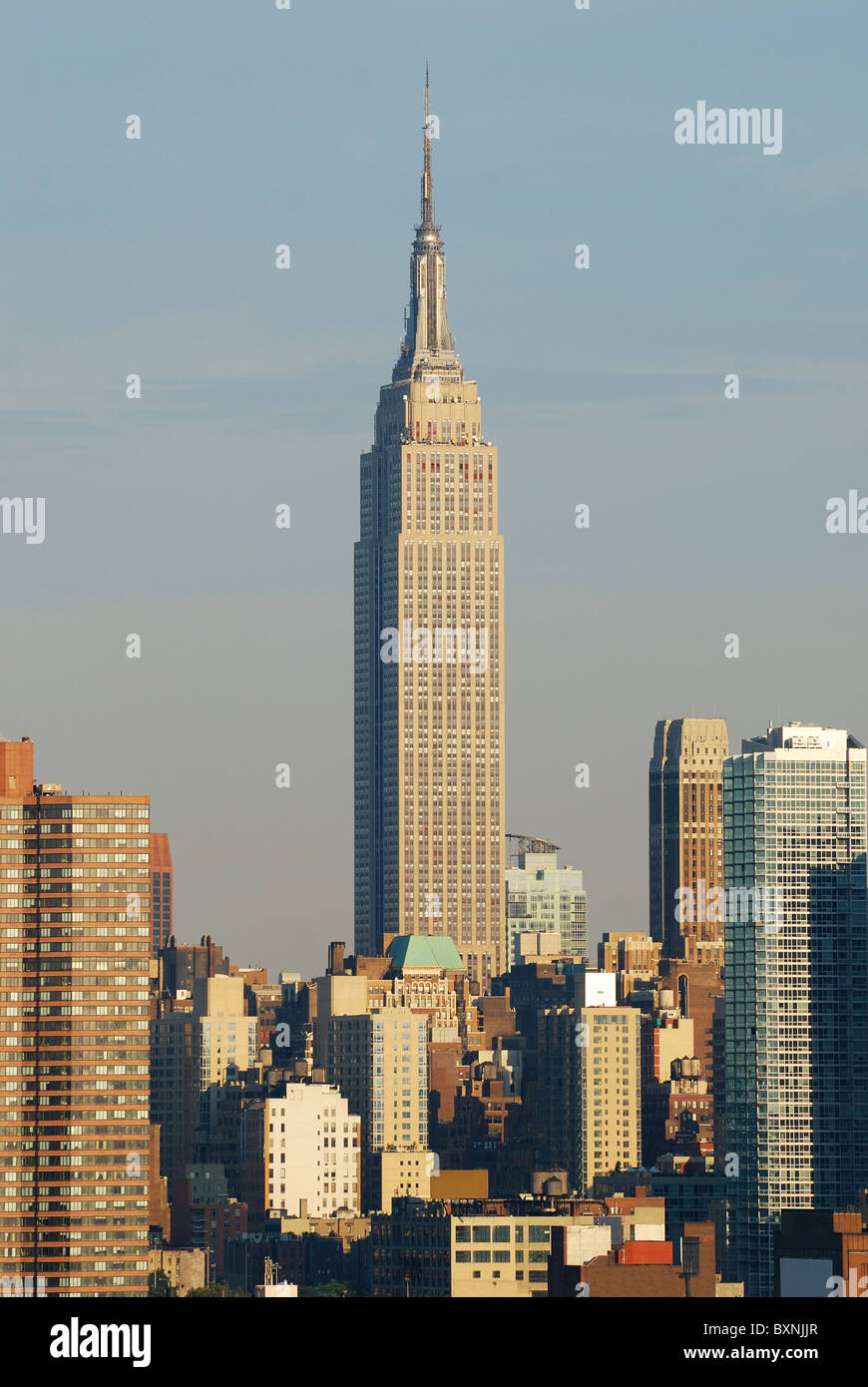 Empire State Building with New York City Manhattan skyline at dusk with ...
