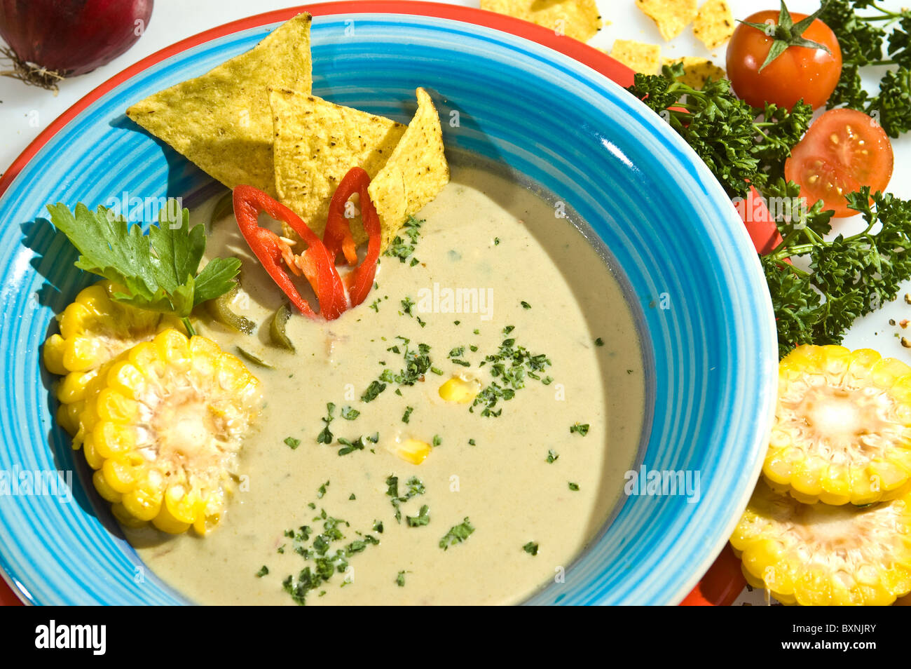 Cream corn soup mexican recipe w jalapenos Stock Photo Alamy