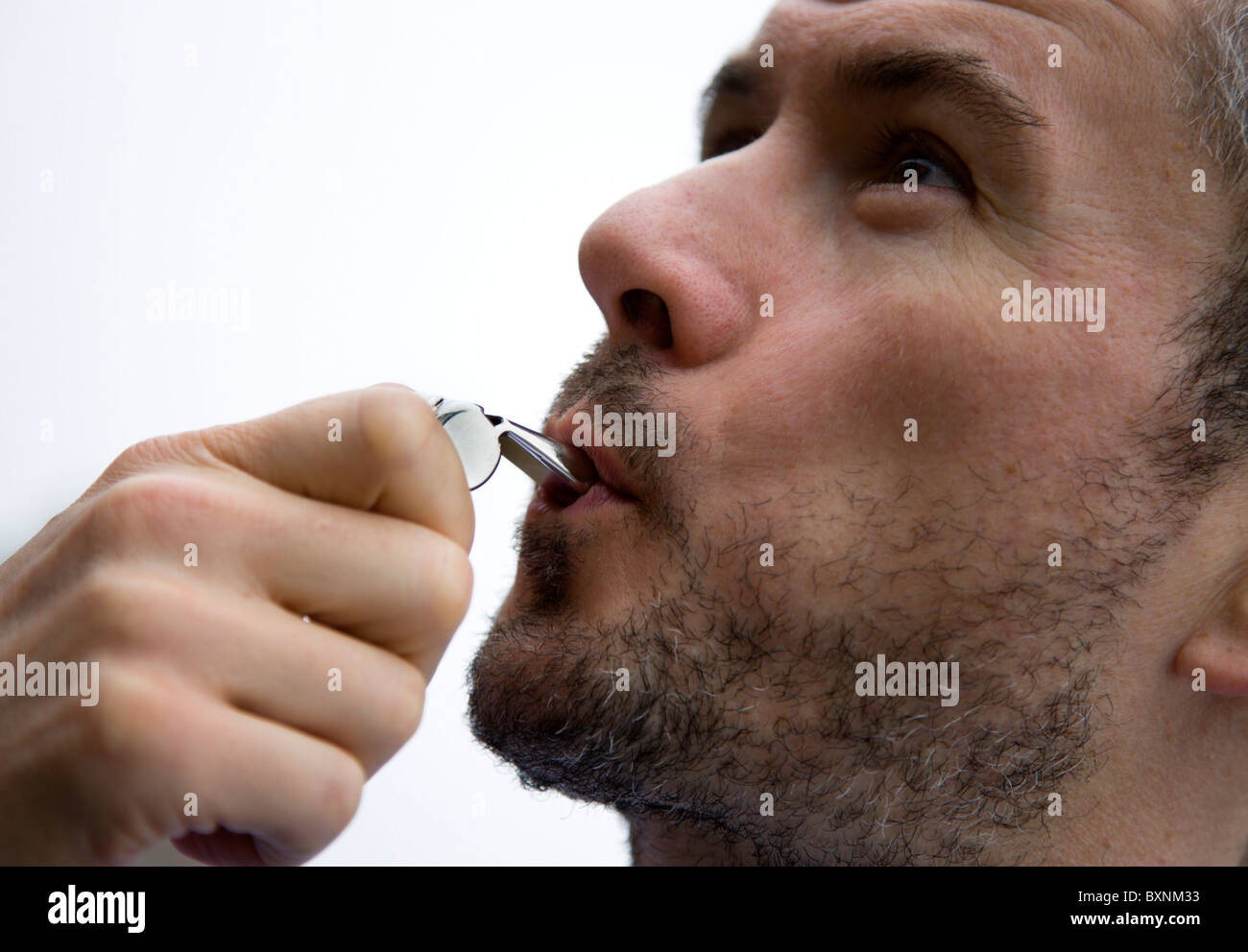 Sport, Ball Games, Referees, Male referee blowing whistle Stock Photo
