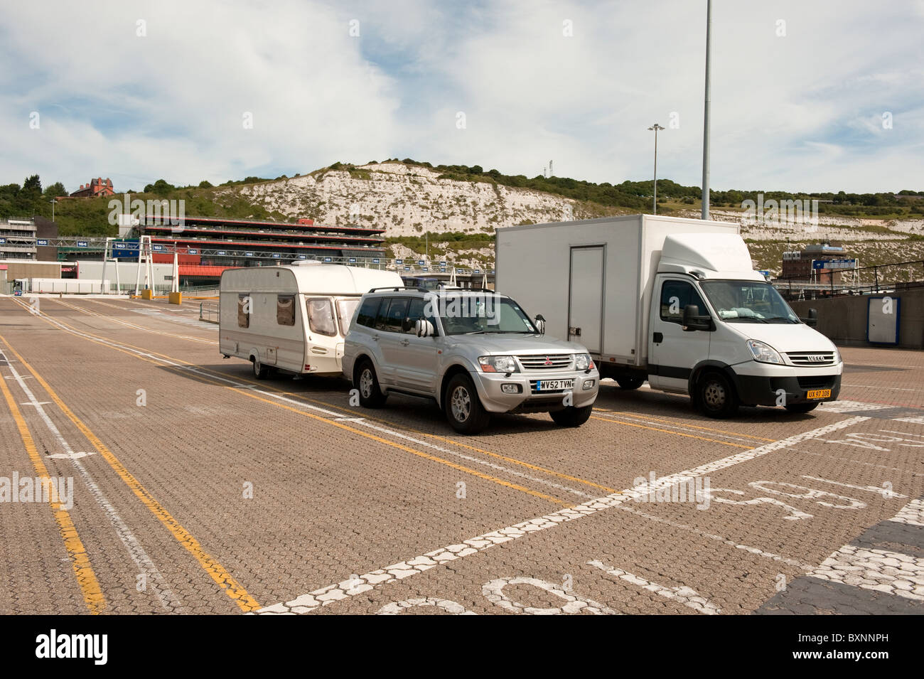 Car & Caravan Vehicles waiting to Board Ferry at Dover Stock Photo