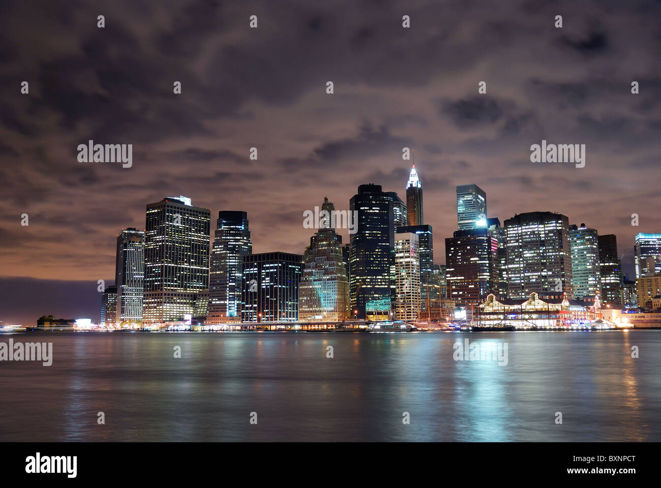 New York City Manhattan skyline panorama view at night with office ...