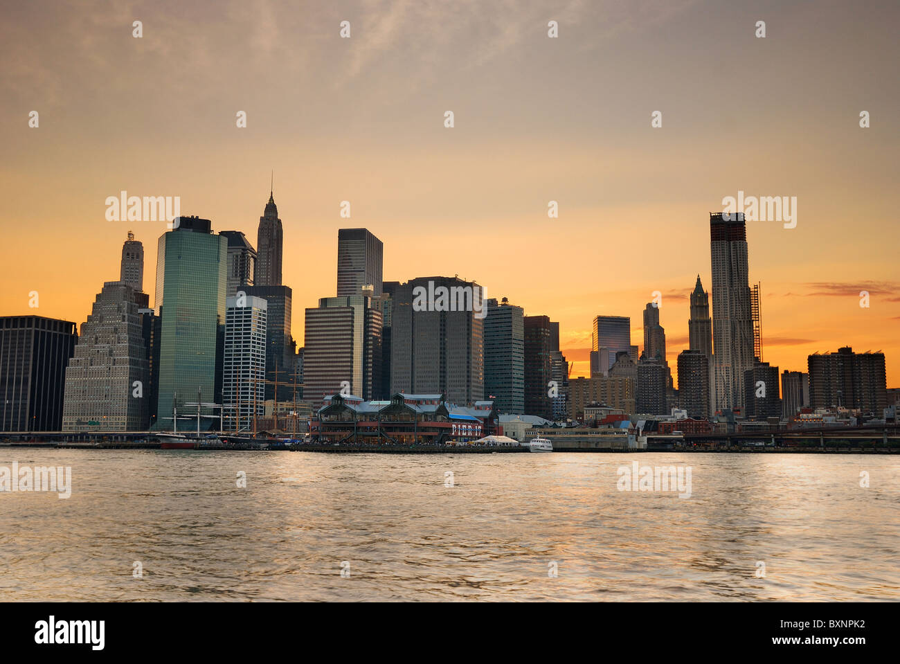 New York City Manhattan skyline at dusk over Hudson River with ...