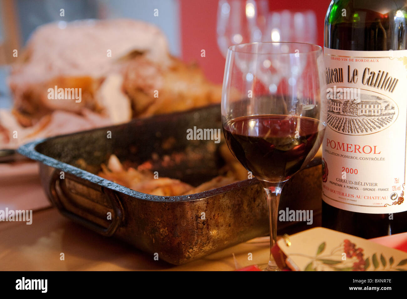 Claret and turkey on the table for Christmas dinner, UK Stock Photo