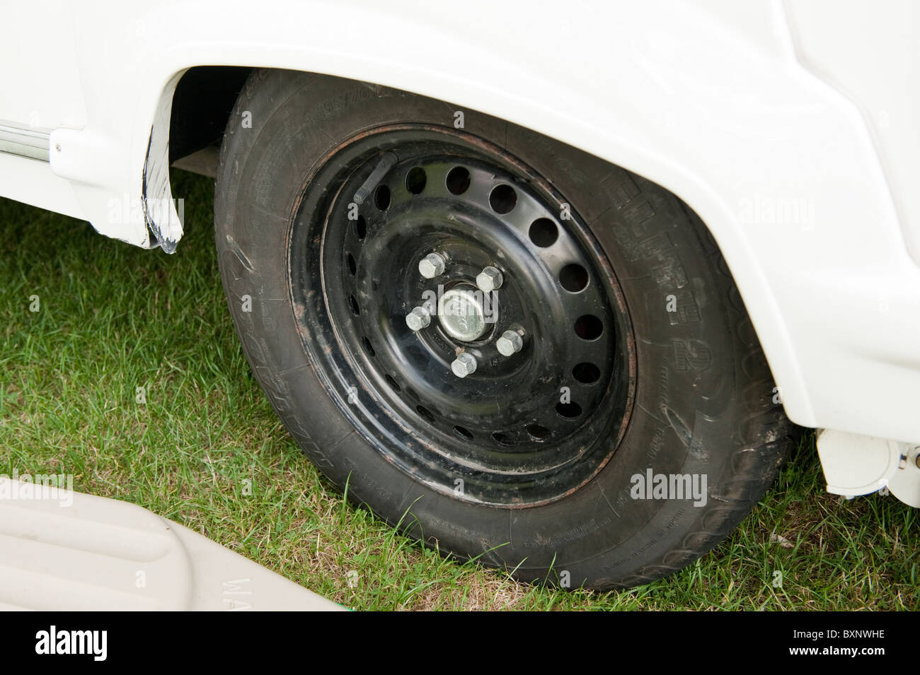 Caravan Wheel and Wheel Arch Damage Stock Photo