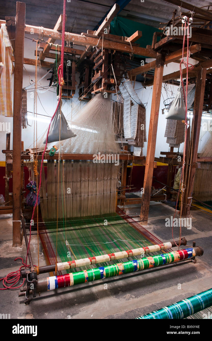 Hand loom making a silk sari in an Indian cottage. Andhra Pradesh, India Stock Photo