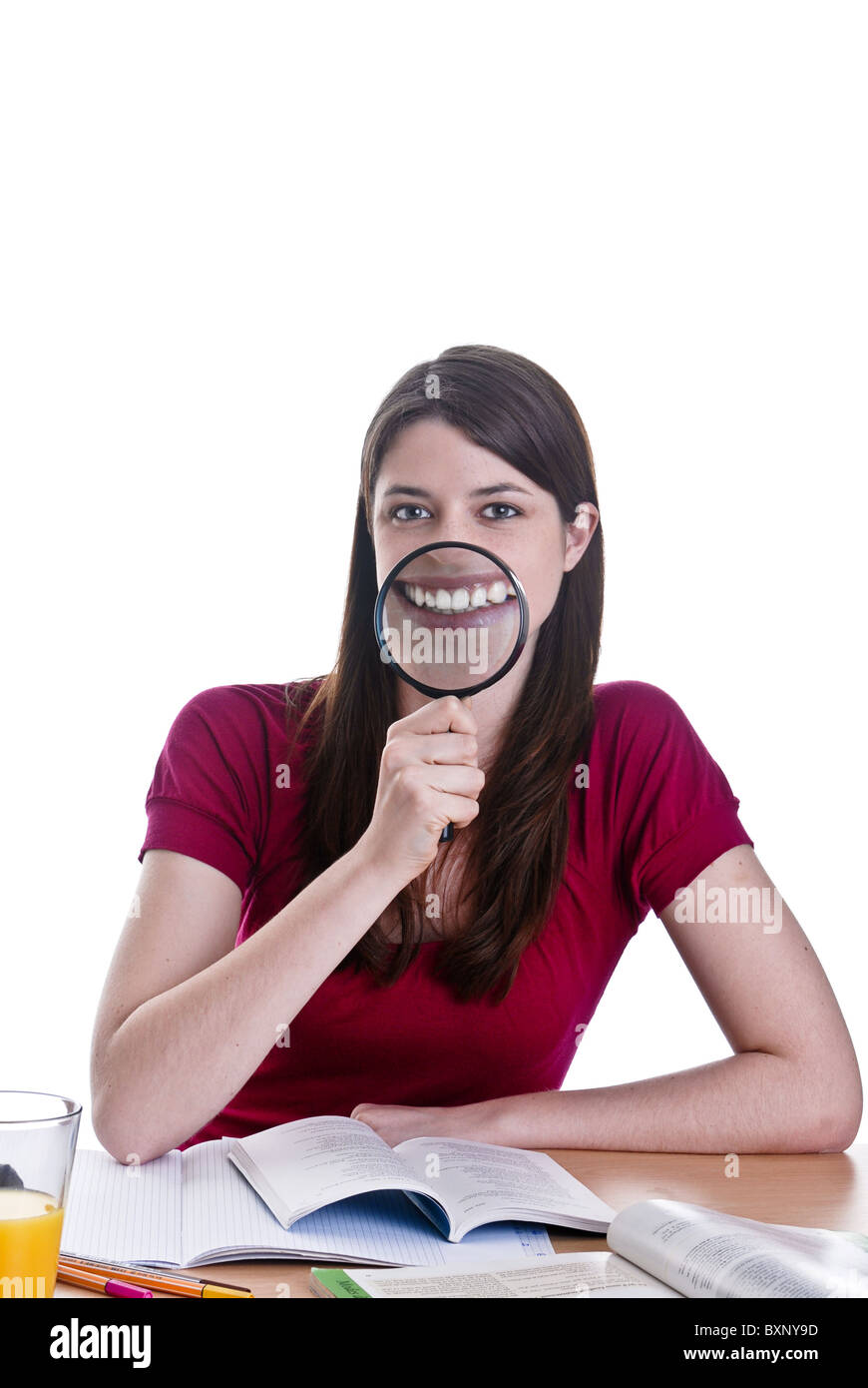 Young woman with magnifying glass Stock Photo Alamy