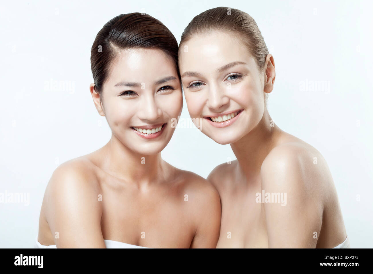beauty shot of two young faces side by side Stock Photo