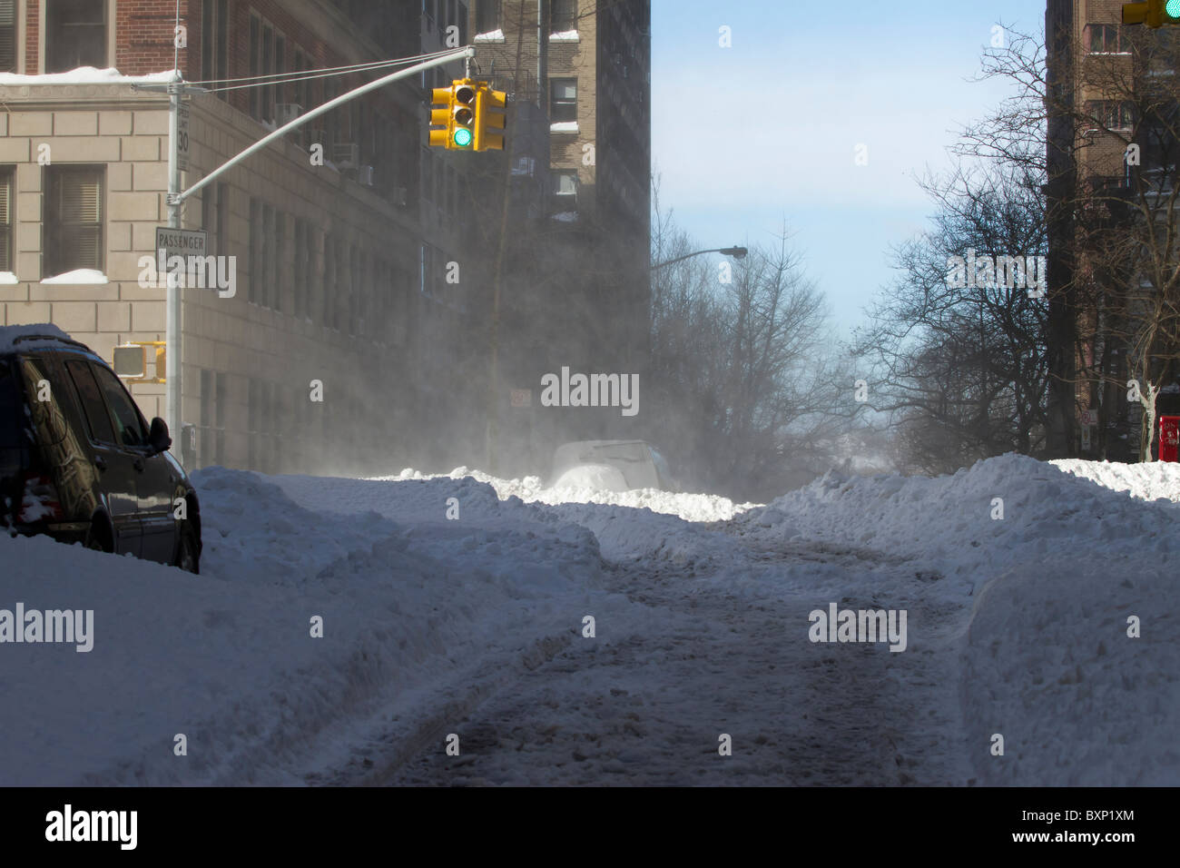 Blowing snow propelled by 50 mph wind gusts the day after a blizzard hit New York City leaving more than two feet of snow. Stock Photo