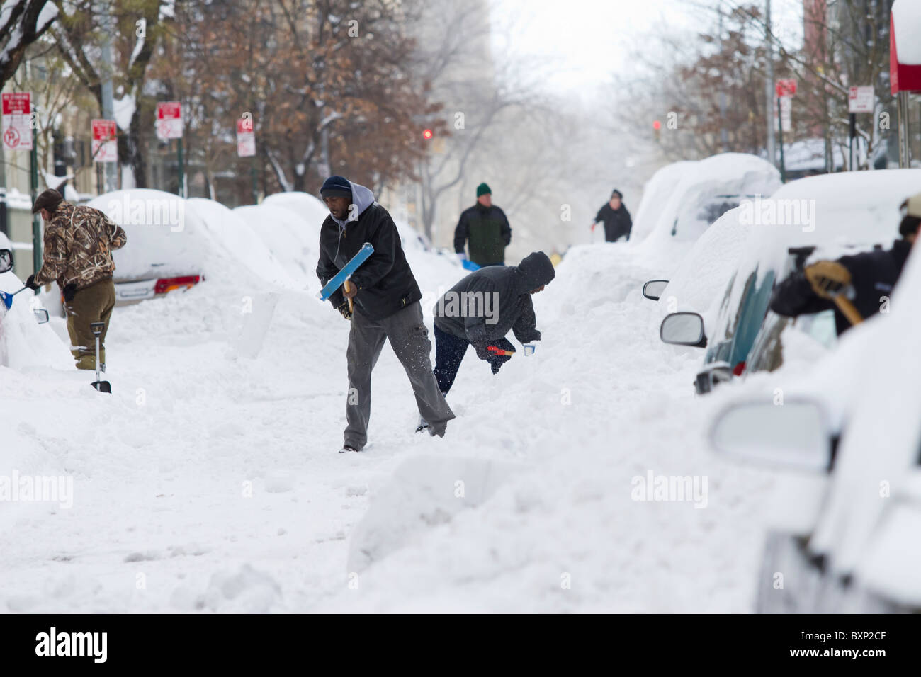 Residents of Manhattan's Upper West Side dig out their cars a day after ...
