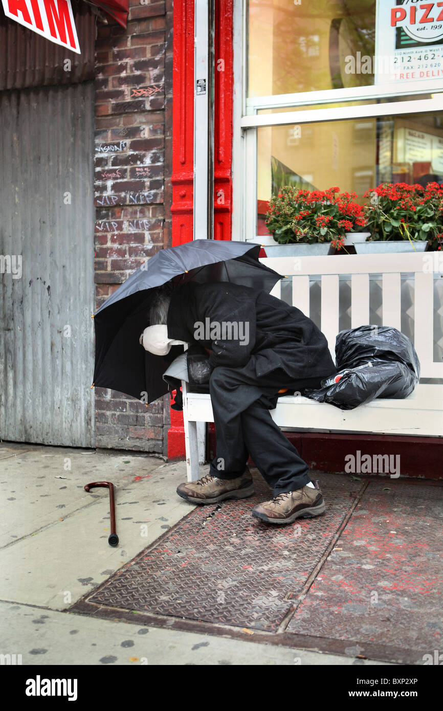 A man sleeping on a bench, New York City, USA Stock Photo - Alamy