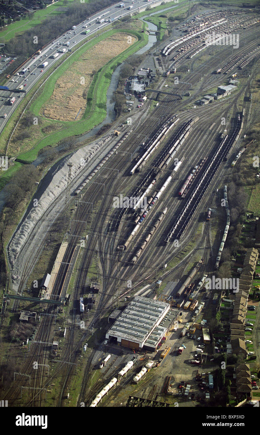 Aerial view of Bescot Freight Terminal and Bescot Stadium Railway Station with the M6 motorway 2002 Stock Photo