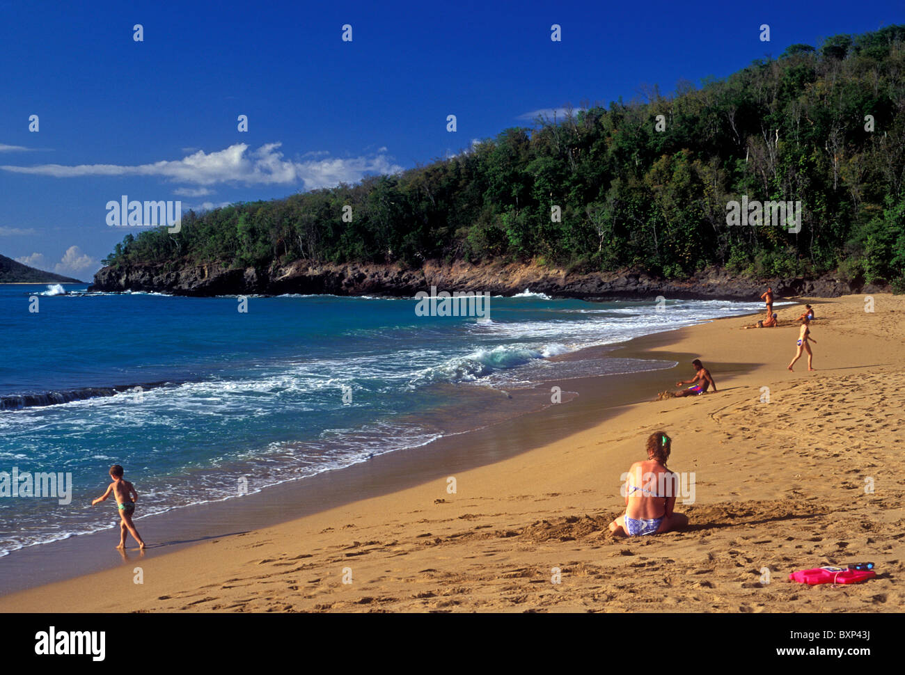 adult woman, young boy, mother and son, Anse de la Perle, beach, near town of Deshaies, Basse-Terre Island, Guadeloupe, French West Indies, France Stock Photo