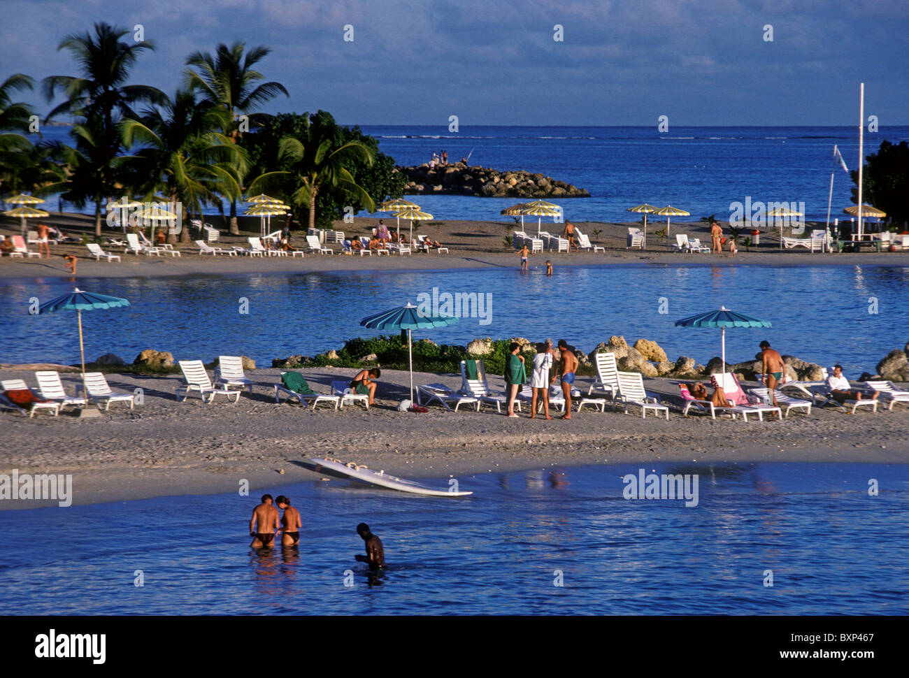 people, tourists, beach, La Grande Baie, town of Le Gosier, Le Gosier, Grande-Terre, Guadeloupe, France, French West Indies Stock Photo