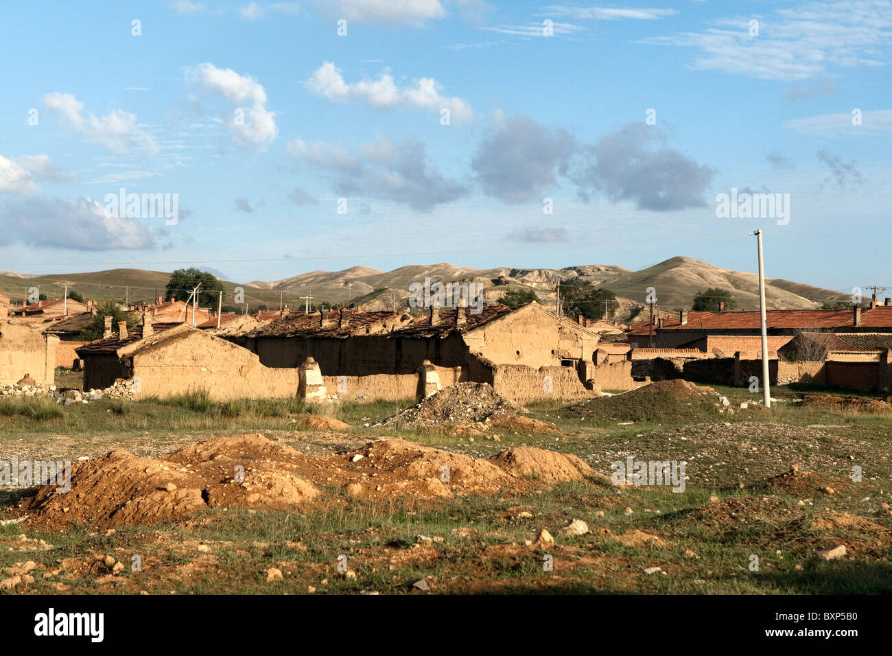 Trans-Mongolian Express China Vistas - houses Stock Photo