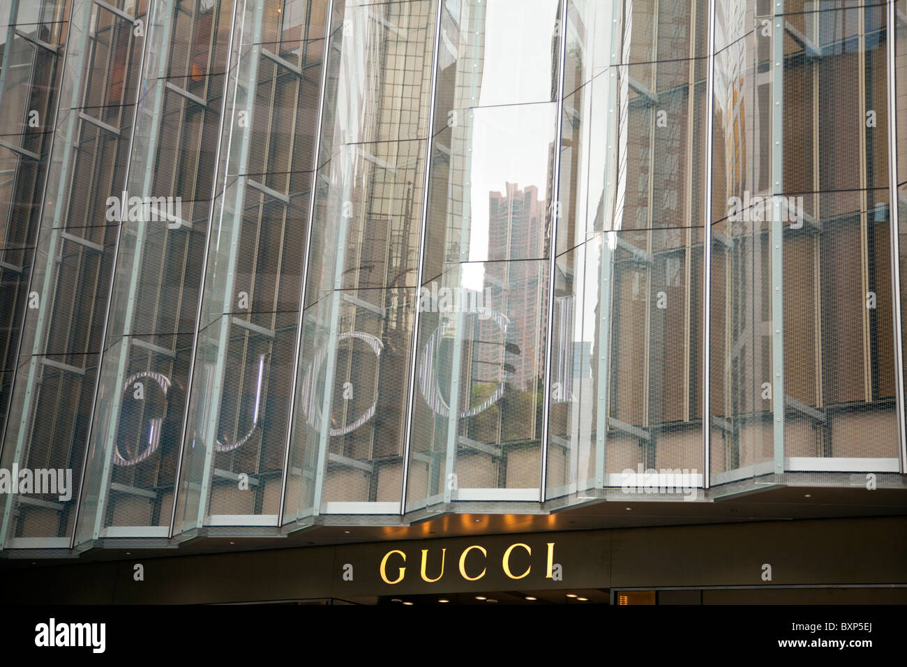 Gucci 15 Queen's Rd. C. (Ice House St. and Queen's Rd. C.) Detail of designer building Hong Kong central Stock Photo