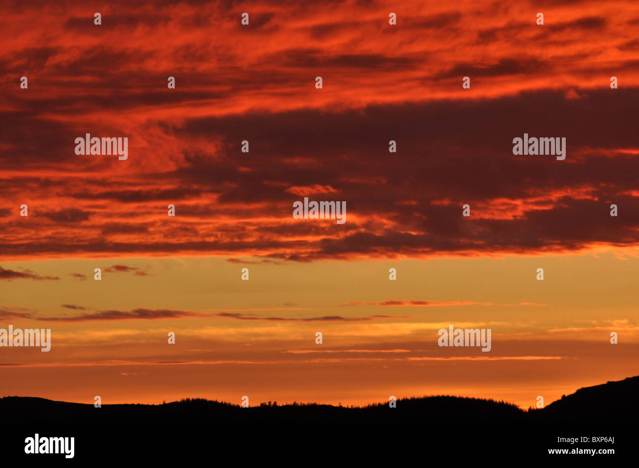 Evening with a beautiful red sky and clouds Stock Photo - Alamy