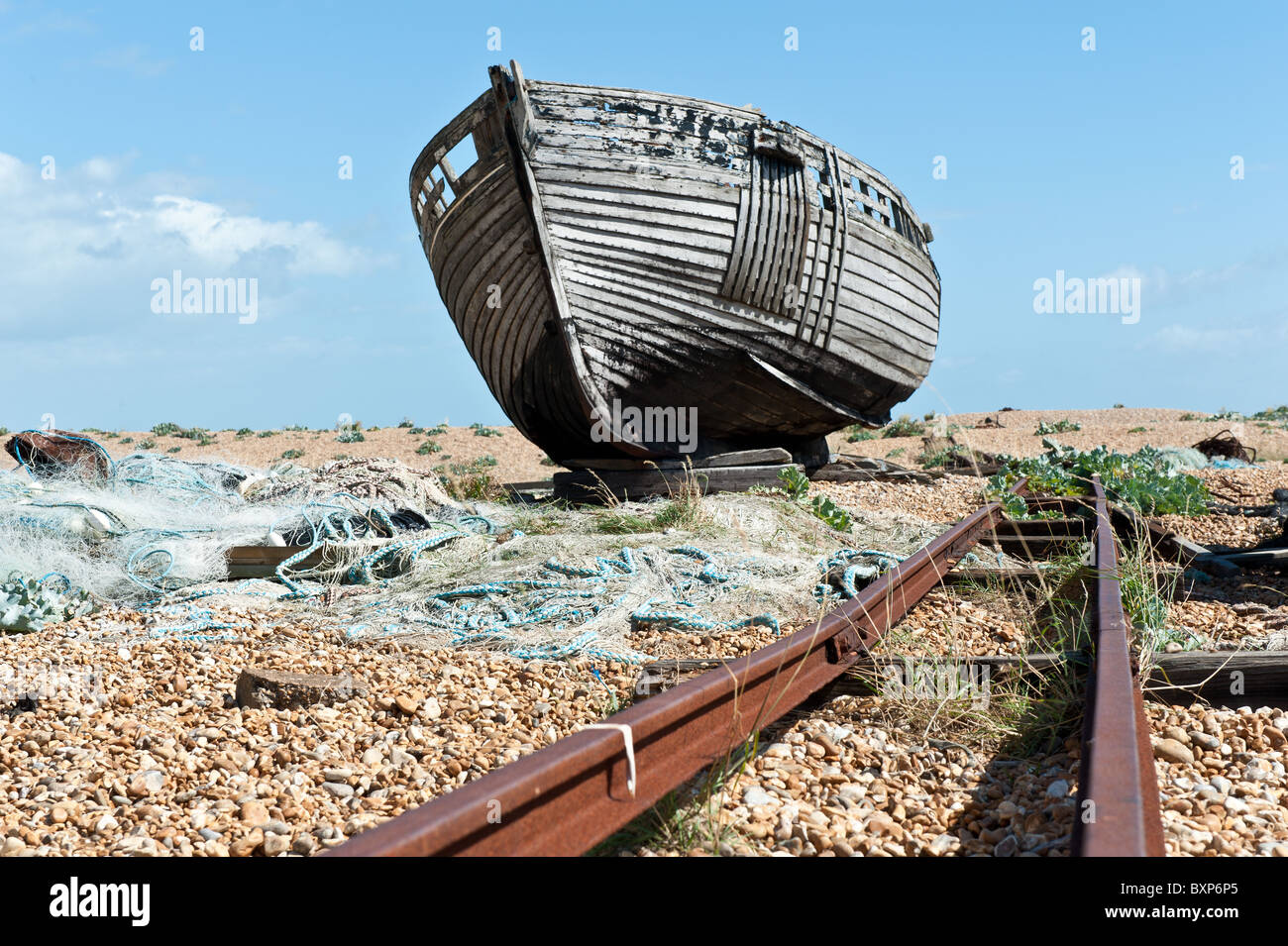 Abandoned old wooden boat on Dungerness shingle and pebble beach Stock ...
