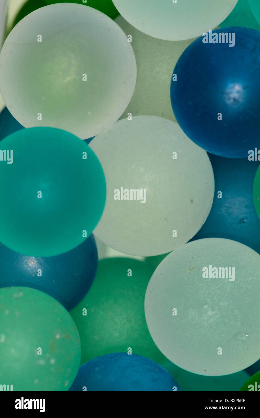 Pale blue and green marbles in closeup Stock Photo Alamy